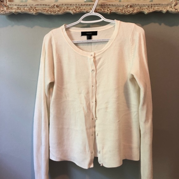 Very warm, button up sweater with faux pearl buttons. Brand: Forever21. - Picture 1 of 2